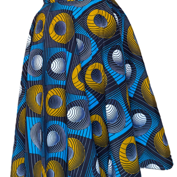Jupe midi wax graphique bleu, jaune et bleu nuit. Taille haute, 100 % coton, coupe fluide et confection artisanale en France.