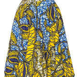 Jupe midi wax jaune et bleue aux motifs feuillages tropicaux. Taille haute, coton 100 %, confection artisanale française.
