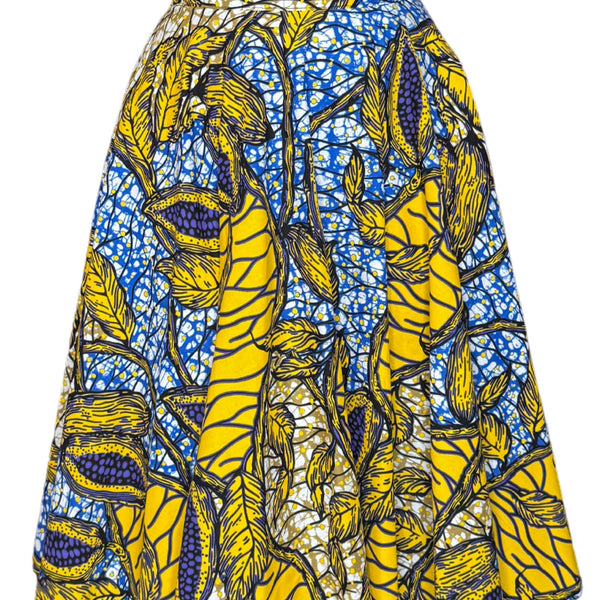 Jupe midi wax jaune et bleue aux motifs feuillages tropicaux. Taille haute, coton 100 %, confection artisanale française.