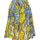 Jupe midi wax jaune et bleue aux motifs feuillages tropicaux. Taille haute, coton 100 %, confection artisanale française.