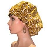 Protégez vos cheveux du desséchement avec notre Bonnet de Nuit Satin et Wax. Fabriqué à la main. Extérieur est en coton (imprimé wax), intérieur en satin polyester.