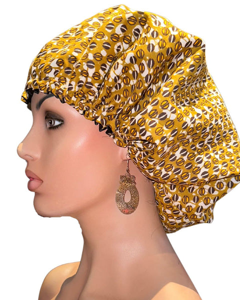 Protégez vos cheveux du desséchement avec notre Bonnet de Nuit Satin et Wax. Fabriqué à la main. Extérieur est en coton (imprimé wax), intérieur en satin polyester.