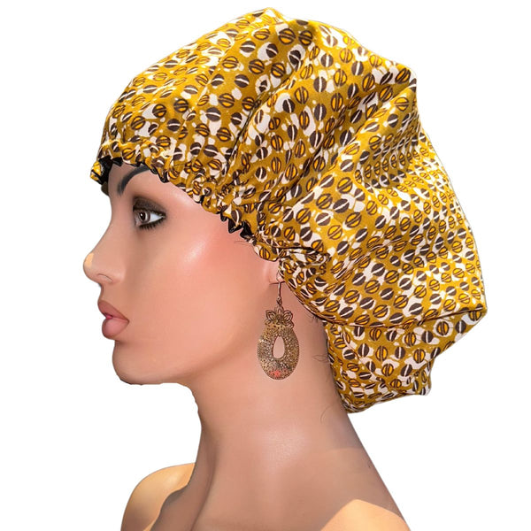 Protégez vos cheveux du desséchement avec notre Bonnet de Nuit Satin et Wax. Fabriqué à la main. Extérieur est en coton (imprimé wax), intérieur en satin polyester.