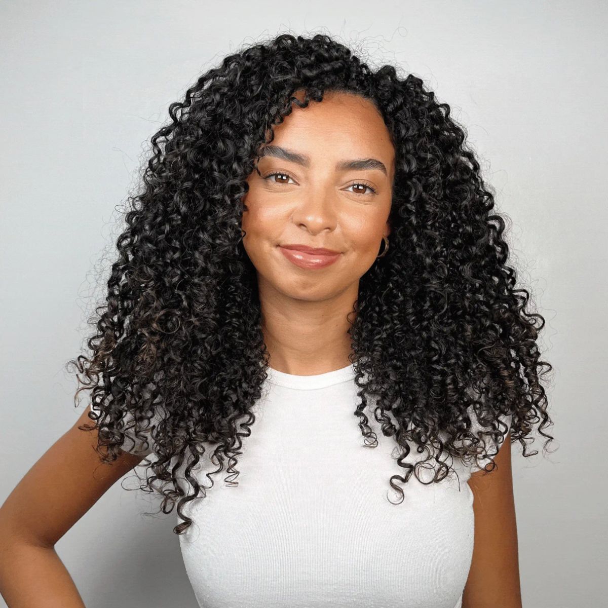 Bouclème - Curl Defence Spray - Colorful BlackSpray protecteur pour cheveux bouclés. Protège de la chaleur, des UV et de la pollution tout en aidant à préserver l’hydratation et la souplesse des boucles.