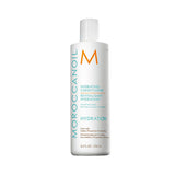 Le Hydrating Conditioner de Moroccanoil est riche en vitamine A et algues rouges. Il retient l'hydratation et ralentit les effets du vieillissement des cheveux. 