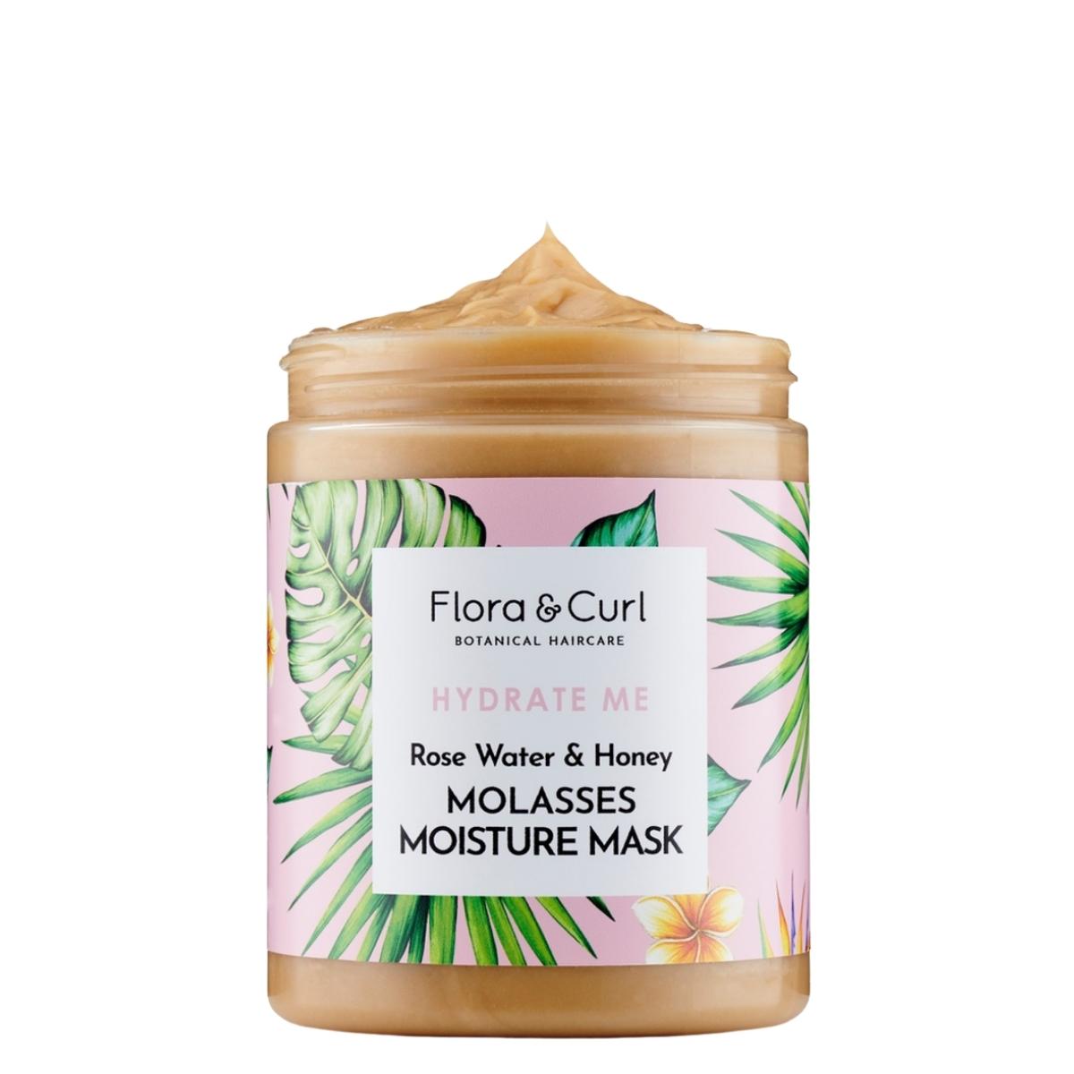 Le masque pour cheveux bouclés Flora & Curl est infusé d'ingrédients ultra-hydratants et à base de plantes, pour des cheveux doux et des boucles repulpées.