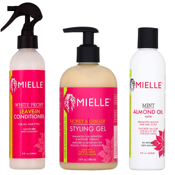 Trio de produits de la gamme Essentials de Mielle Organics pour hydrater et définir vos boucles tout en nourrissant vos pointes et votre cuir chevelu.